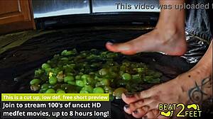 raven rogue gets drenched and sticky smashing grapes barefoot on beat2feetcom