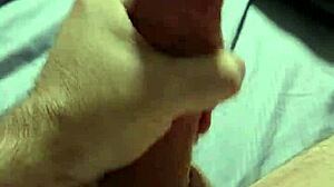 stroking my huge tattooed cock hard till massive cumshot!