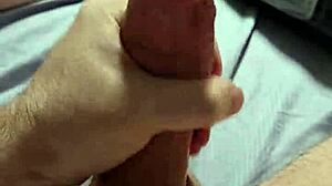 stroking my huge tattooed cock hard till massive cumshot!