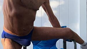 deep pelvic stretches in blue briefs on chair late oct 2024