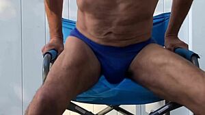 deep pelvic stretches in blue briefs on chair late oct 2024