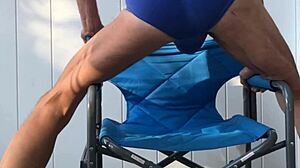 deep pelvic stretches in blue briefs on chair late oct 2024