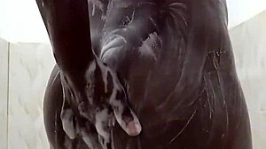 Horny bottom strokes huge black cock in homemade shower masturbation