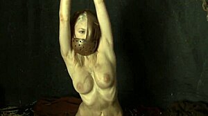 cute cosplay babe chained up fingers shaved pussy and boobs