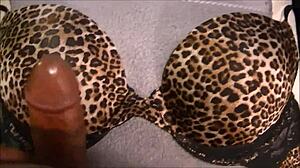 Jerking off and cumming all over that 36d bra print!