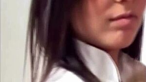 brune babe squeezes into shiny tight purple pvc panties