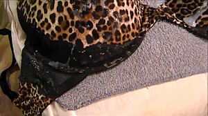 Jerking off and cumming all over that 36d bra print!