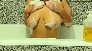 She soaks in bath ripping clothes for juicy vibrator play