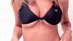 closer look at all-black bikini thongs in club?