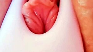 shaved babe's tight pussy gets toyed to wet orgasm close up