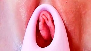 shaved babe's tight pussy gets toyed to wet orgasm close up