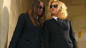 Three shaved babes lick strap on in black stockings orgy