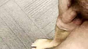 She strips bare and struts confidently through the crowded office at work.