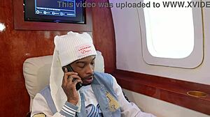 detailed passenger adjusts bonnet carefully during takeoff on crowded commercial airplane flight