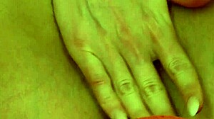 gorgeous blonde babe fingers her shaved pussy with toys