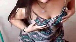 amateur girl strips teasingly during her steamy bath time