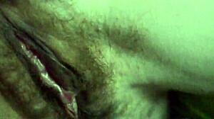 playing with my wet hairy pussy in low light feels so good