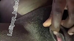 Sexy black babe gets wildly horny after smoking at home