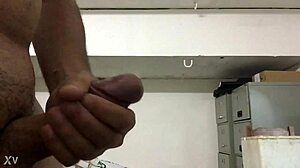 Watch her stroke massive cock to explosive cumshot