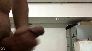 Watch her stroke massive cock to explosive cumshot