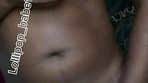 Sexy black babe gets wildly horny after smoking at home