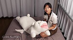 Chained cutie toys shaved pussy to wet orgasm