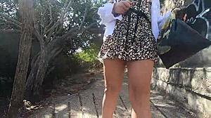 Novinha flashes shaved pussy publicly on beach in tiny thong bikini