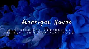 Watch her cross legs teasingly in sheer black pantyhose