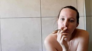 Hey, check out this cute girl's bathroom smoking fetish!
