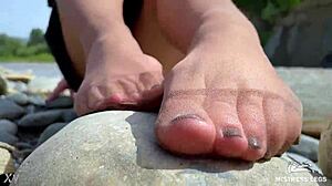 goddess teases cute nylon soles and toes riverside in tan pantyhose