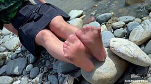 goddess teases cute nylon soles and toes riverside in tan pantyhose