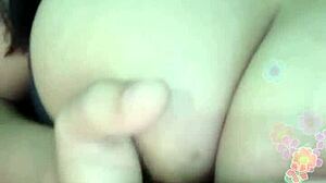 indonesian webcam babe flashes her perky asian boobs