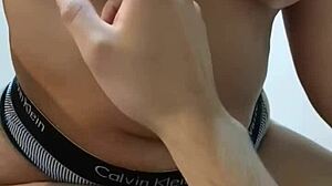 Touching Her Navel During Handjob