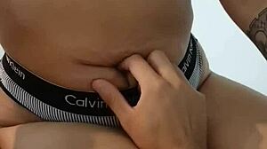 Touching Her Navel During Handjob