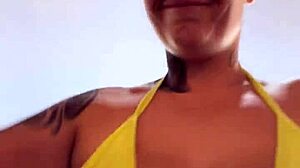 at the beach gym in transparent thong bikini piercing showing wet
