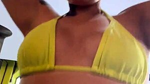 at the beach gym in transparent thong bikini piercing showing wet