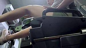 Gym beauty's public pussy massage erupts in wild squirting bench chaos