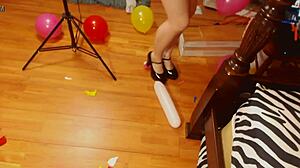 Fifi Foxx Pops Balloons in Sexy High Heels!