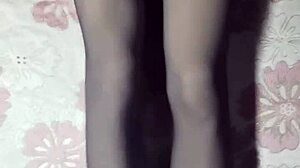 crossdresser strokes cock in pantyhose and tight jeans