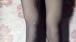 crossdresser strokes cock in pantyhose and tight jeans