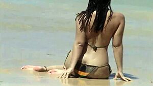 Peach Teases Her Ass On Caribbean Beach Waves