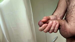 close-up cock stroke before steamy bath time