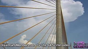 Topless Brunette Flashes Big Tits in Convertible Over Skyway Bridge