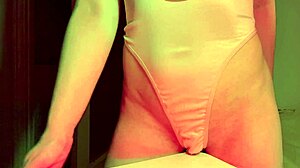 she rubs herself sensually on the table edge