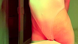 she rubs herself sensually on the table edge