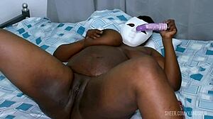 african bbw spreads oiled ass for squirting dildo pleasure