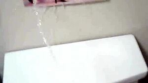 nude pic makes her piss in shower!