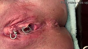 pierced clit milf rubs hard in latex gloves unleashing pee stream