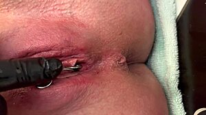 pierced clit milf rubs hard in latex gloves unleashing pee stream