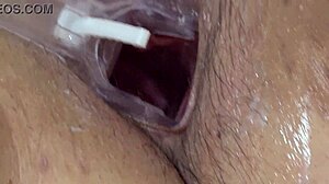 Chubby milf's hairy pussy gapes wide from speculum fisting post-shower